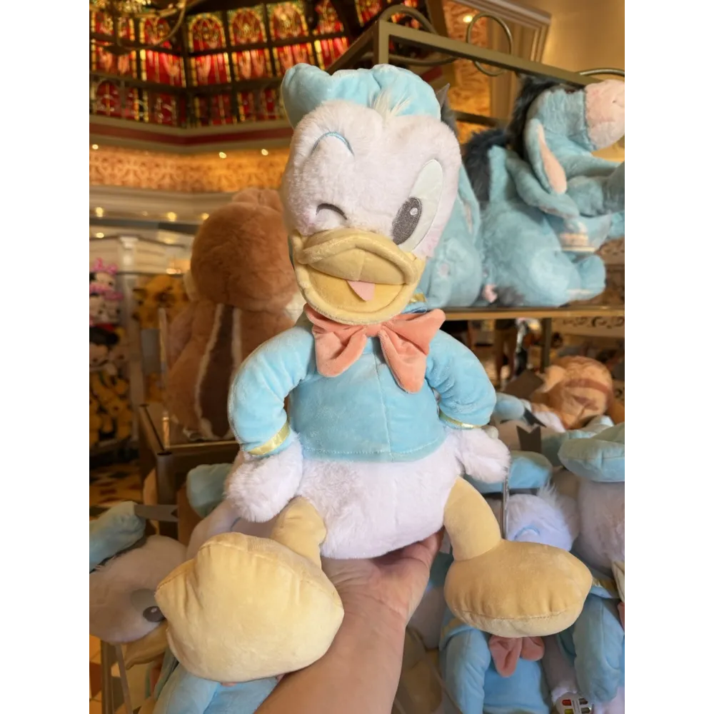 Peluche Donald Duck pastel – Doudou suave y auténtico