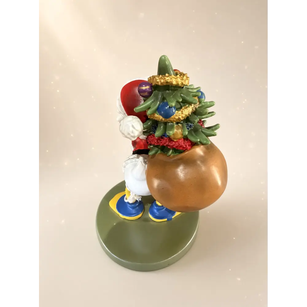 Scrooge McDuck Santa Claus figurine with Christmas tree – Disneyland Paris