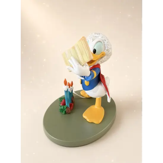 Estatua de Navidad de Donald Duck leyendo su lista – Disneyland Paris