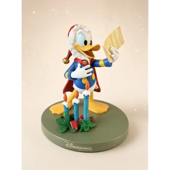 Weihnachtsstatue von Donald Duck beim Lesen seiner Liste – Disneyland Paris