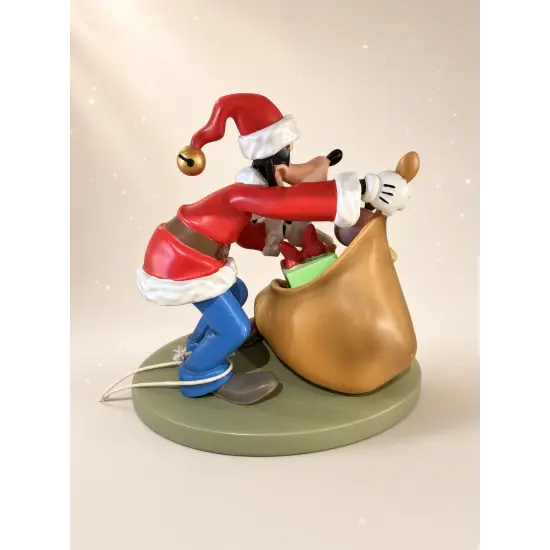 Goofy Weihnachtsmann-Figur mit Spielzeug-Sack – Disneyland Paris