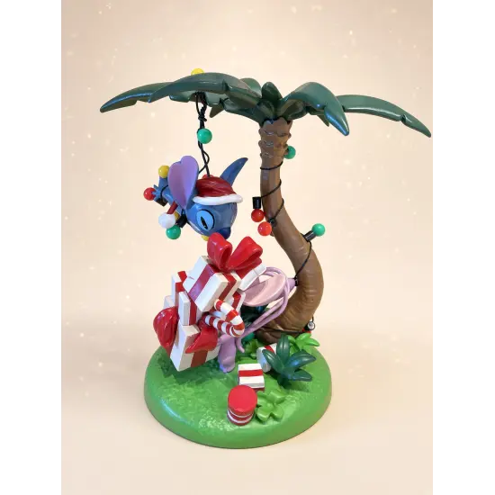 Weihnachtsfigur Stitch und Angel unter einer Palme – Disney