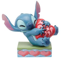 Figurine Stitch serrant un cœur Disney Traditions