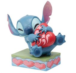 Figurine Stitch serrant un cœur Disney Traditions
